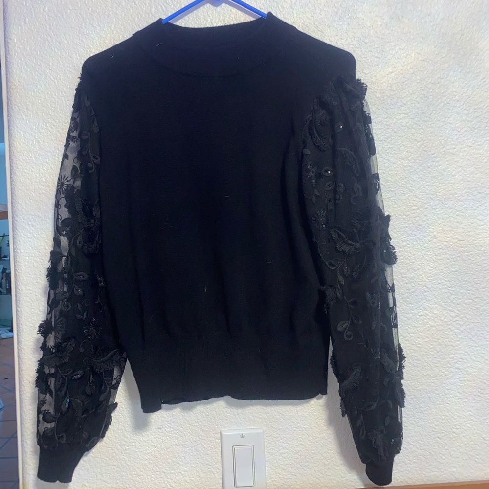 Sweater with floral sleeves
